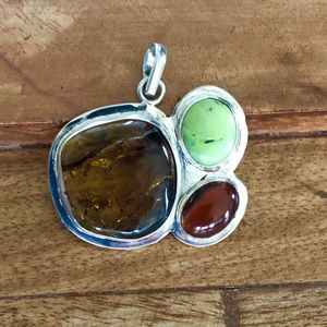 Pendant of amber and green turquoise.
